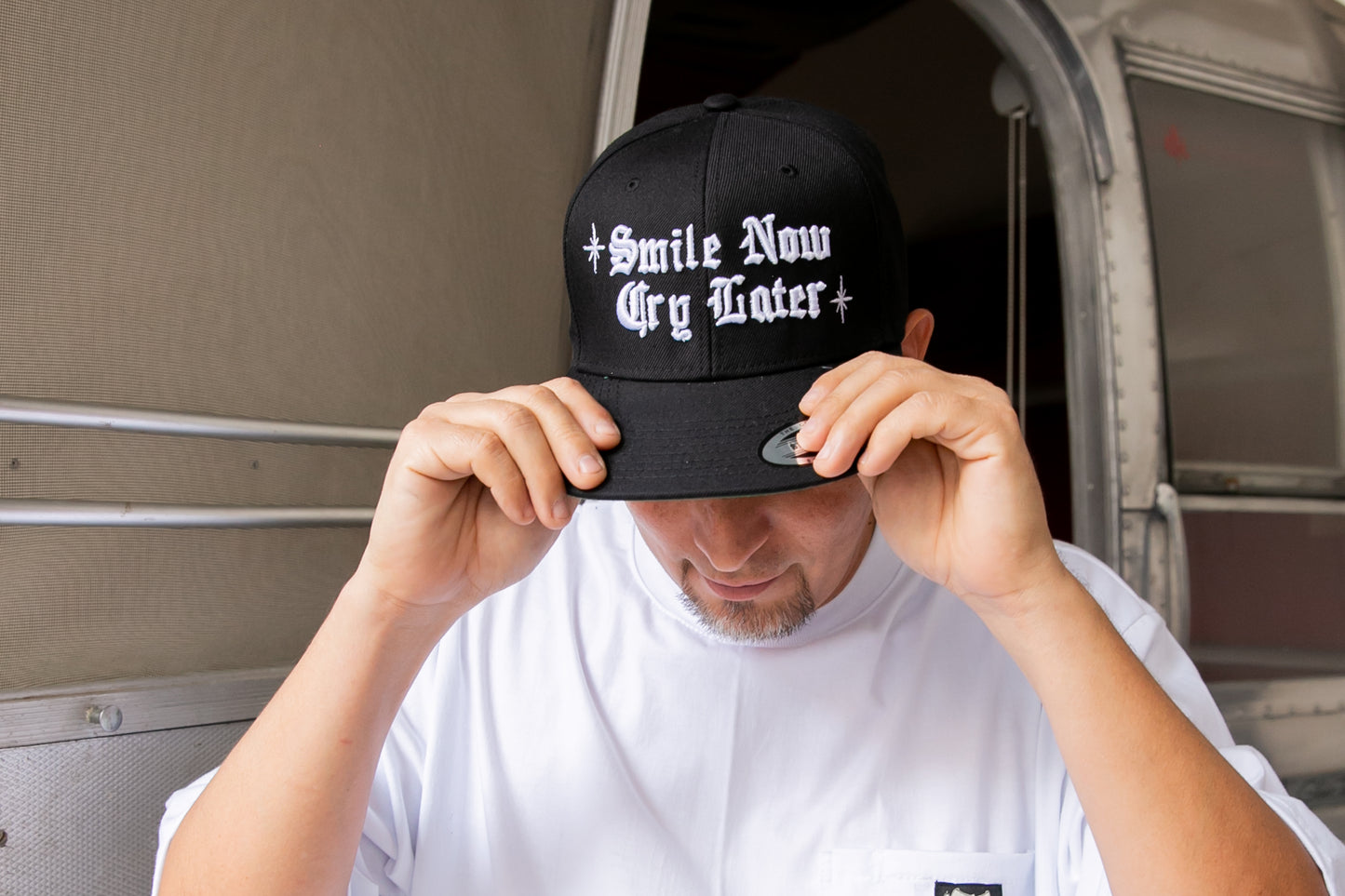 Gorra “Smile now,cry later”
